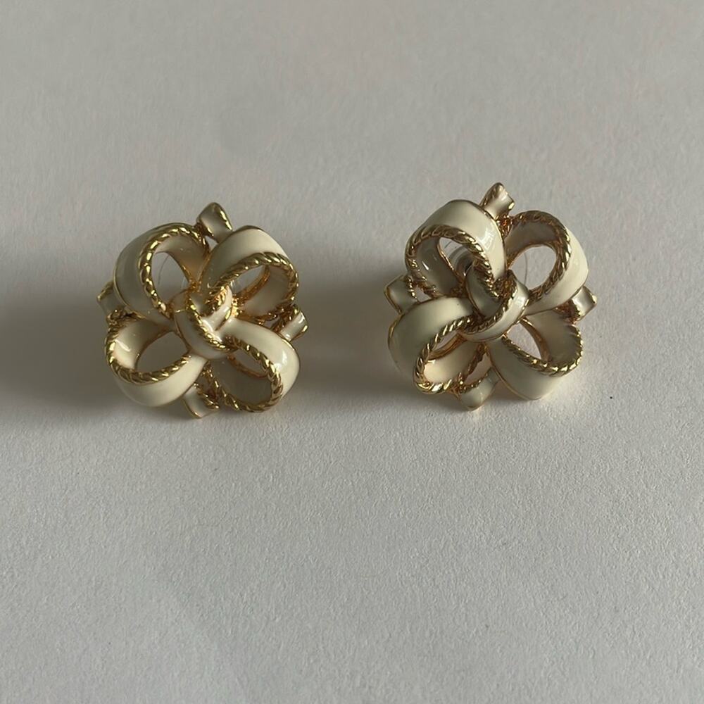 Rucinni gold and white earrings